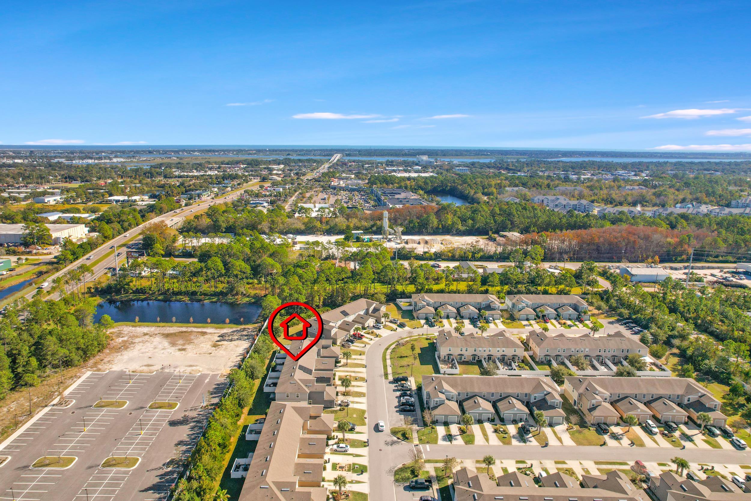187 Whitland Way St. Augustine, FL 32086 - Photo 26 of 30 an aerial view of residential building and lake