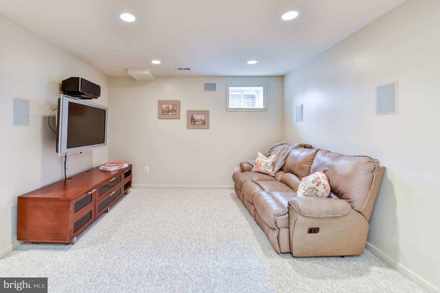 7810 Falstaff Road McLean, VA 22102 - Photo 22 of 30 Lower level family/rec room with media system