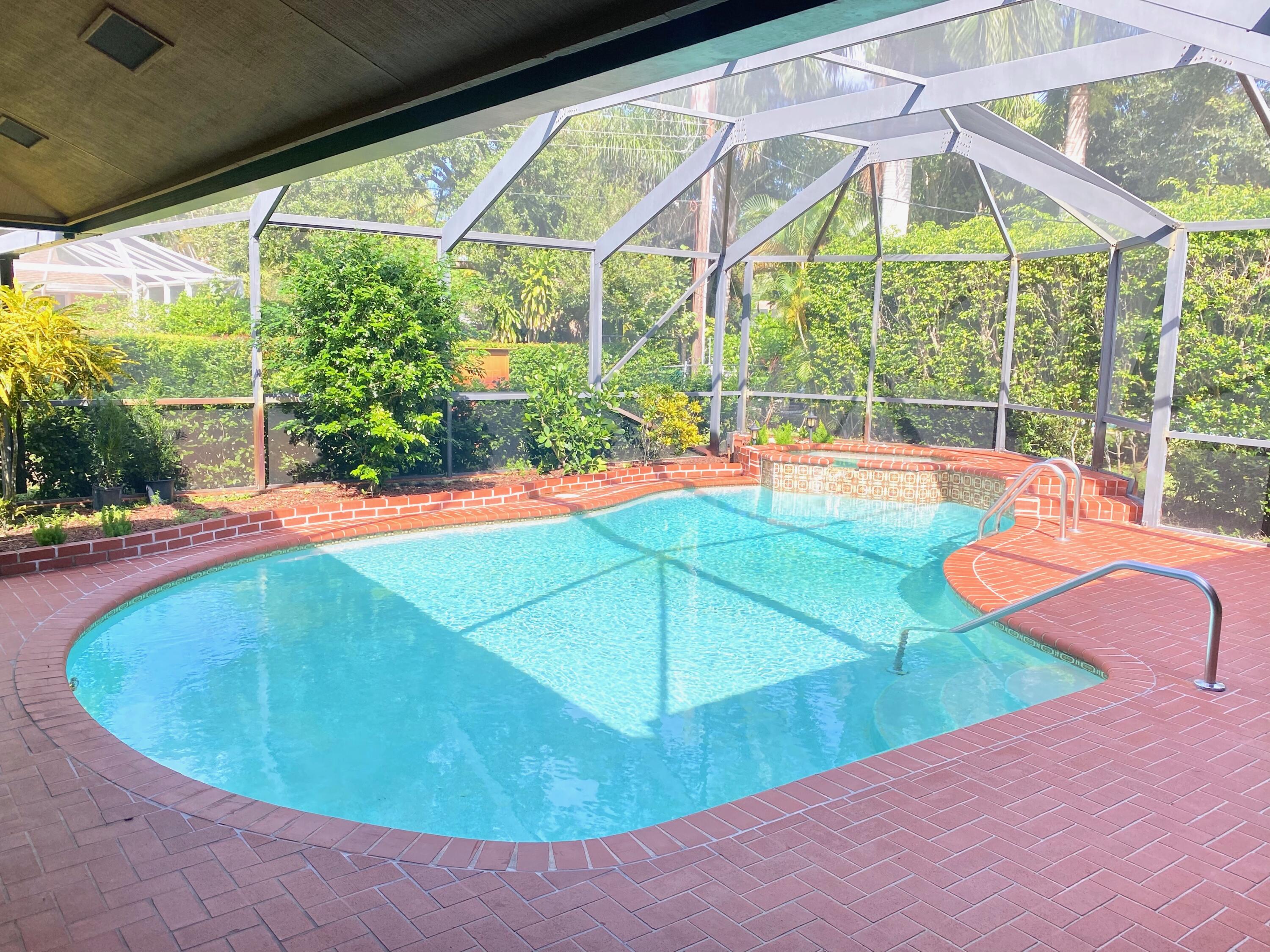 5585 Pennock Point Road Jupiter, FL 33458 - Photo 2 of 21 pool backyard