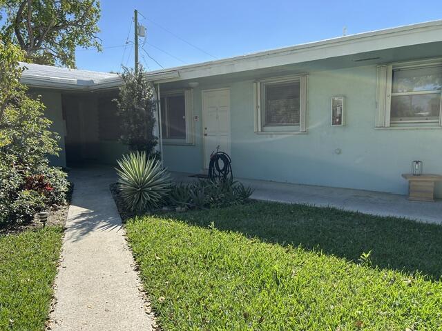 3801 Northeast 22nd Terrace, Unit 5 Lighthouse Point, FL 33064 - Photo 2 of 14 front of apt