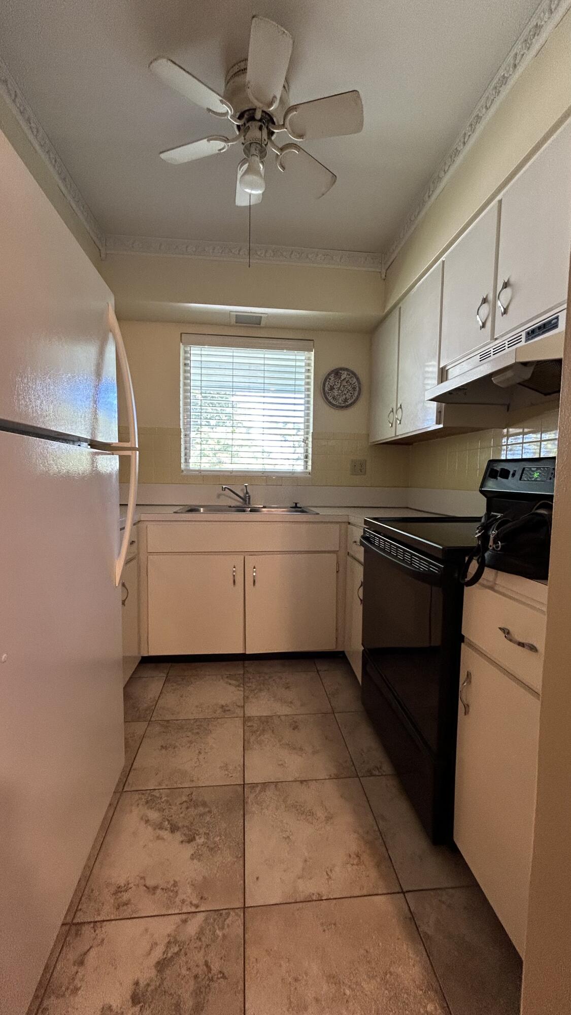 3801 Northeast 22nd Terrace, Unit 5 Lighthouse Point, FL 33064 - Photo 7 of 14 kitchen