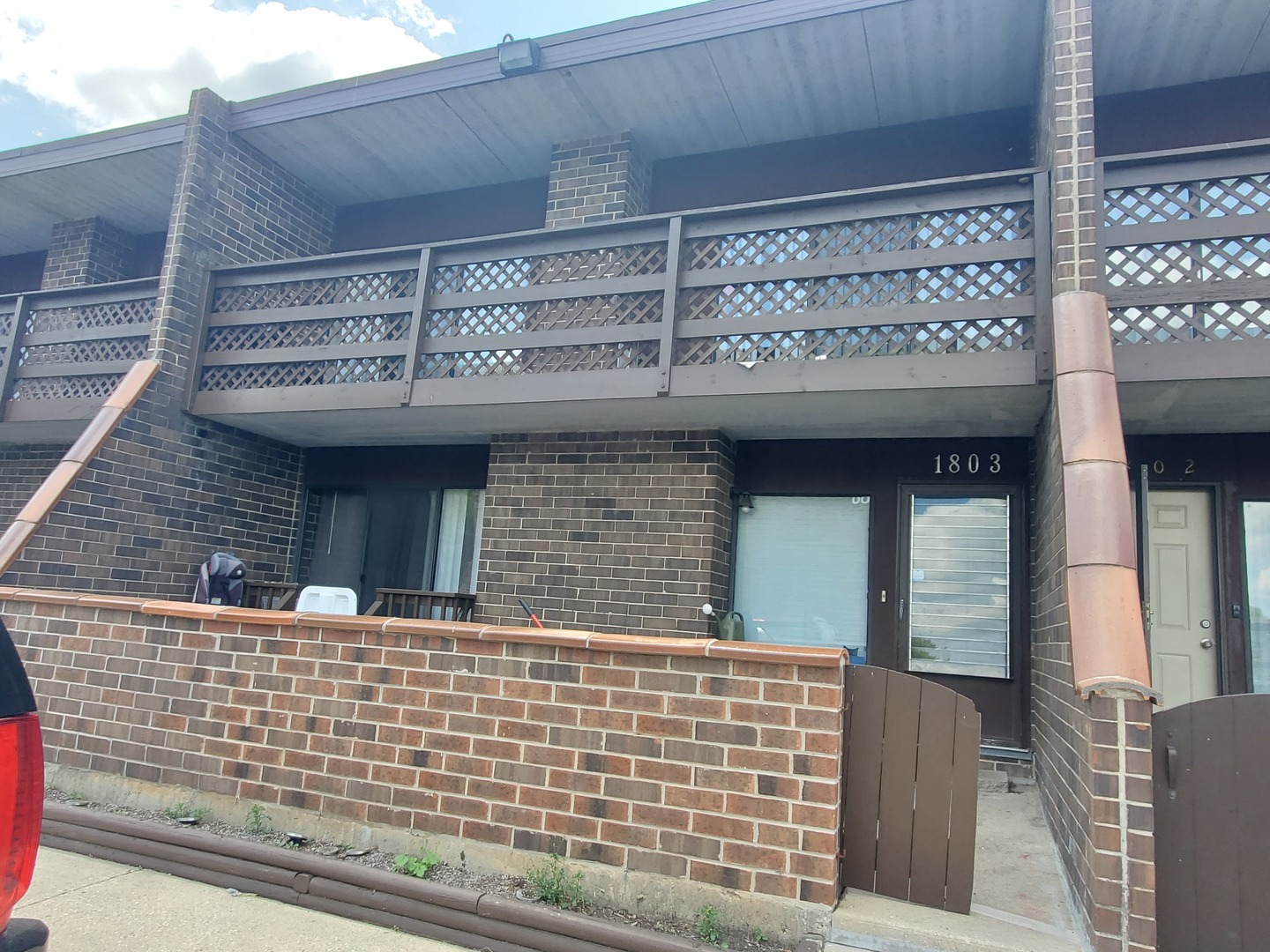 1803 Kenneth Circle Elgin, IL 60120 - Photo 1 of 4 a front view of a building