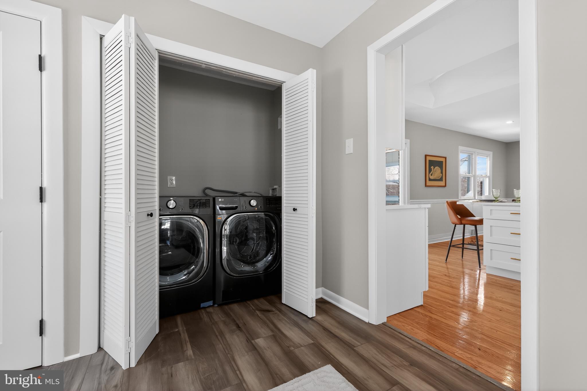 516 Beatty Road Springfield, PA 19064 - Photo 15 of 36 a view of a hallway with a washer and dryer