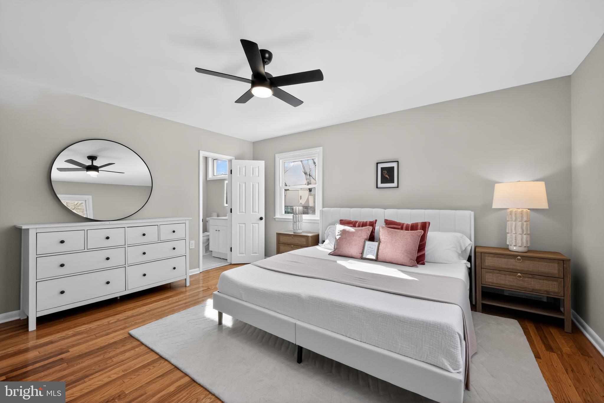 516 Beatty Road Springfield, PA 19064 - Photo 20 of 36 a bedroom with a bed and a chandelier