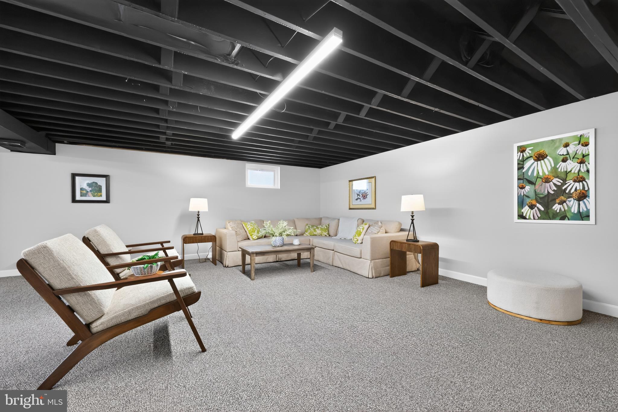 516 Beatty Road Springfield, PA 19064 - Photo 30 of 36 a living room with furniture and a couch