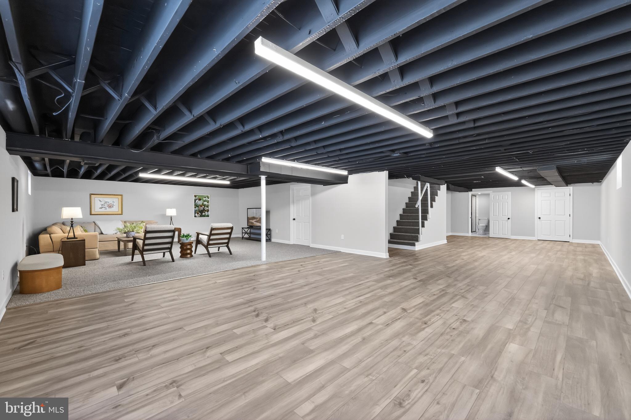 516 Beatty Road Springfield, PA 19064 - Photo 31 of 36 a view of a water heater room with wooden ceiling