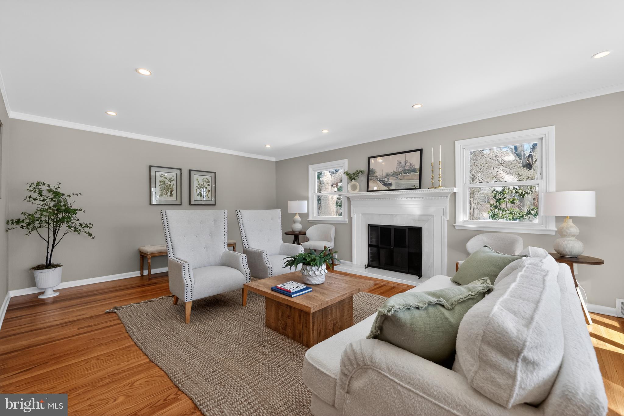 516 Beatty Road Springfield, PA 19064 - Photo 5 of 36 a living room with furniture and a fireplace