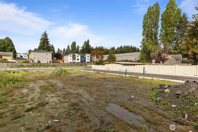 a view of a yard with an trees