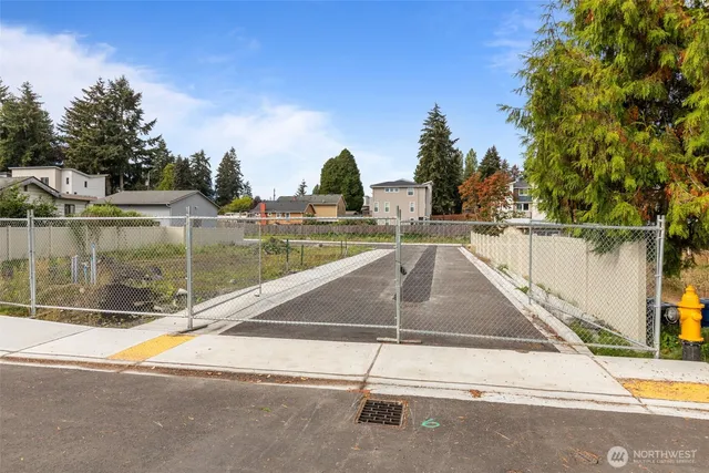 a view of a swimming pool with a patio