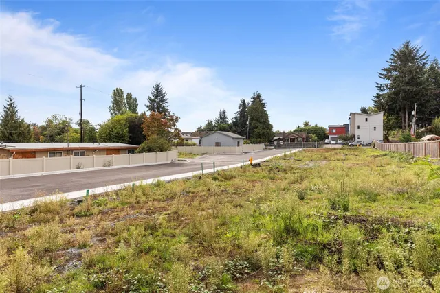 a view of a swimming pool with an outdoor space and seating area