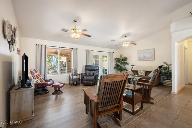 a spacious bathroom with a double vanity sink and a mirror