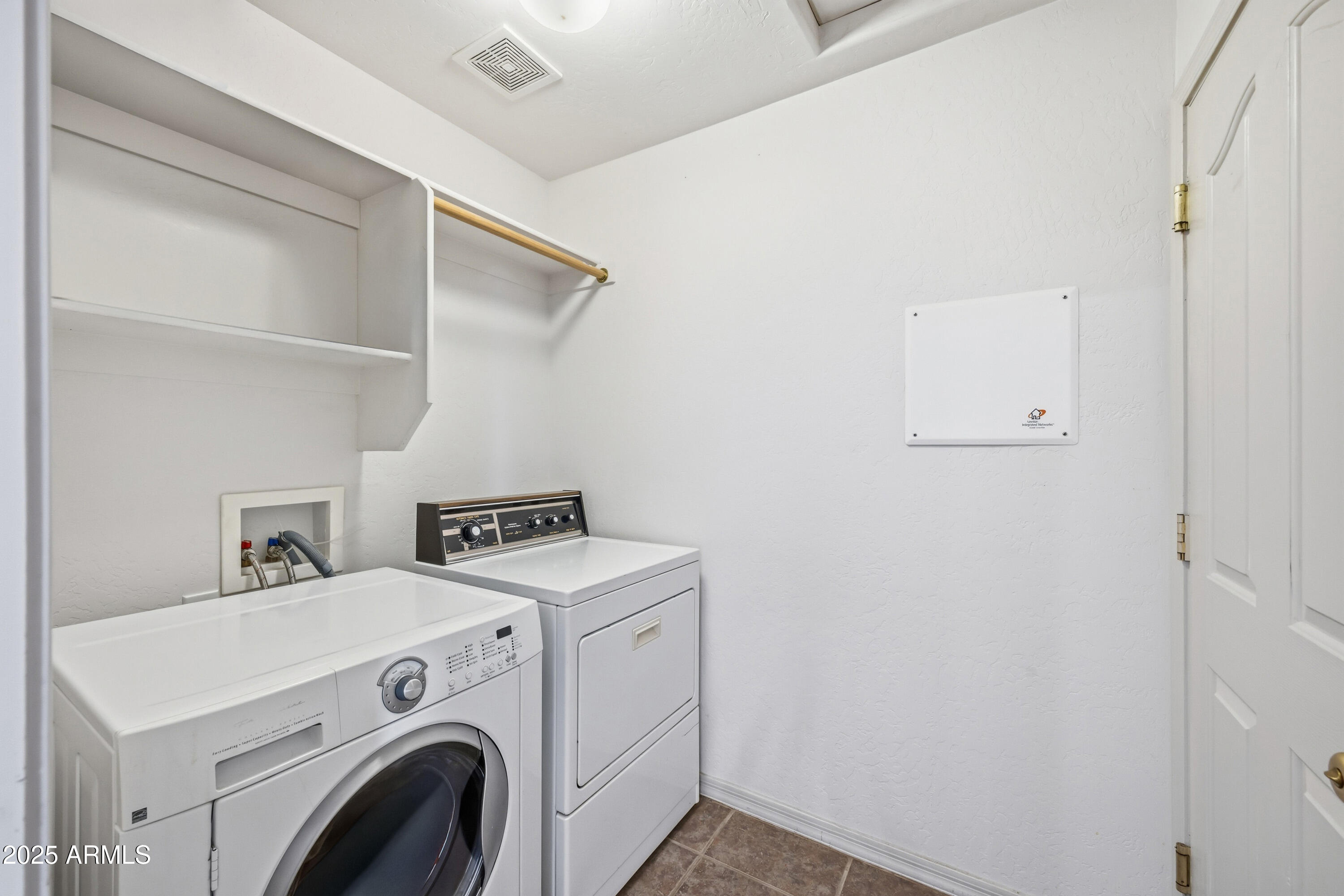 14844 South Brook Hollow Road Arizona City, AZ 85123 - Photo 29 of 35 a utility room with dryer and washer