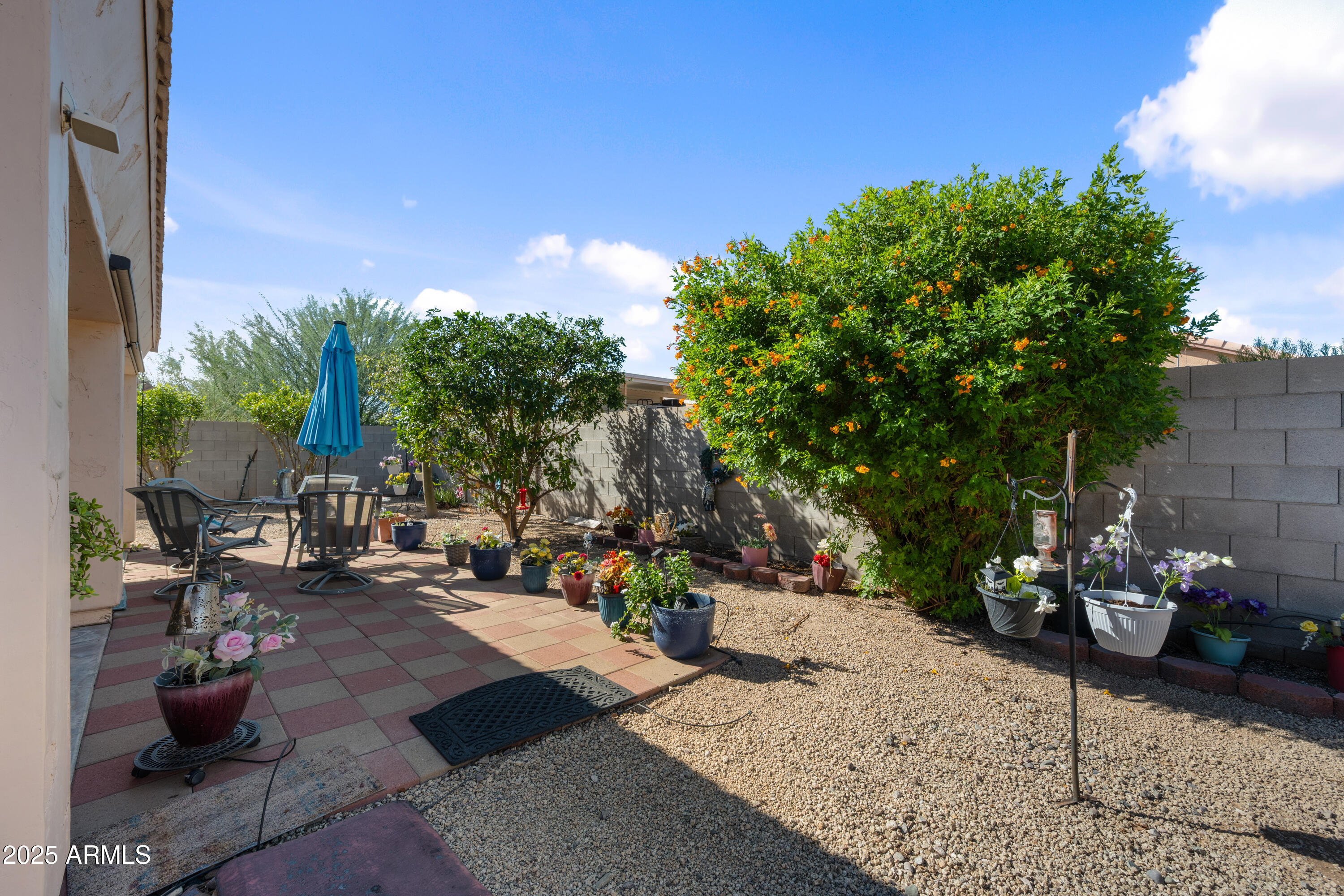 14844 South Brook Hollow Road Arizona City, AZ 85123 - Photo 5 of 35 a view of a backyard with sitting area