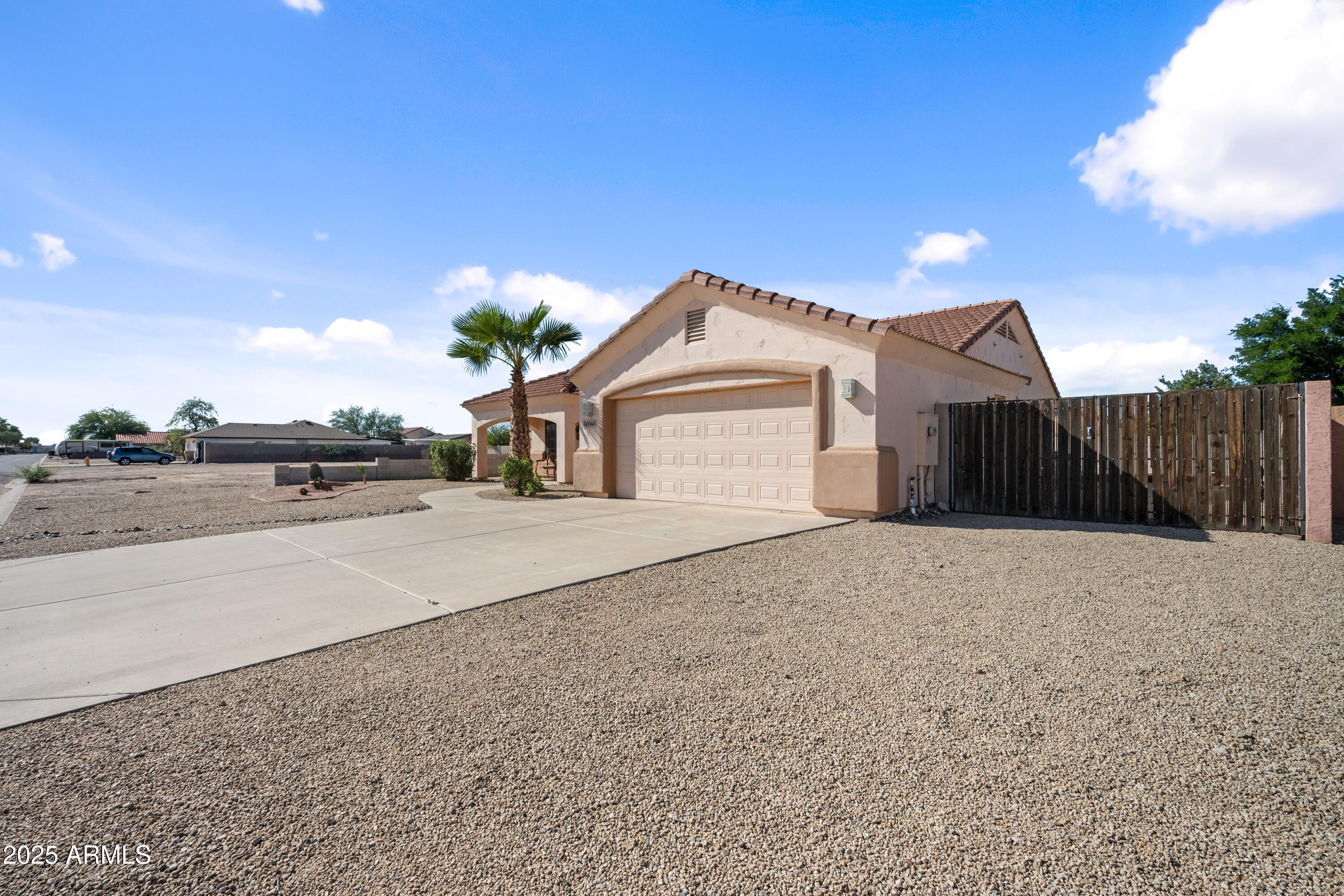 14844 South Brook Hollow Road Arizona City, AZ 85123 - Photo 7 of 35 a view of house with a street