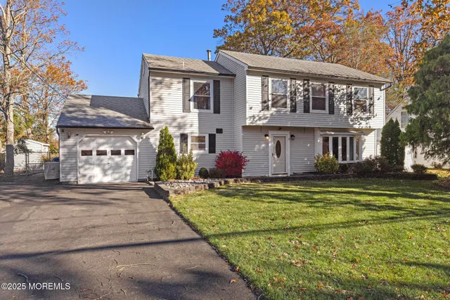 a front view of a house with swimming pool