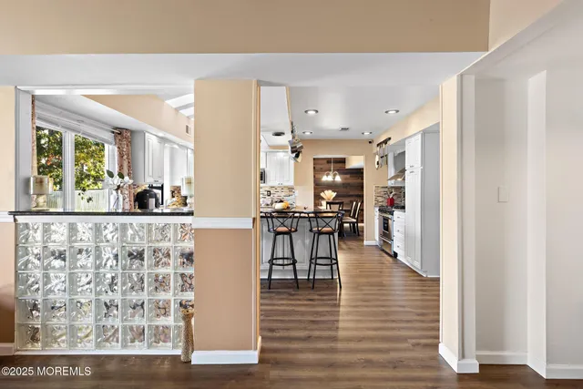 a view of a living room with windows