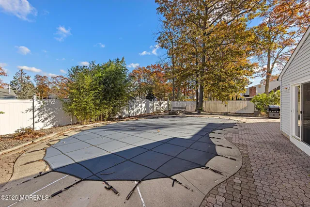 a view of yard with patio