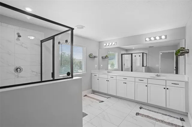 a room with gym equipment and windows