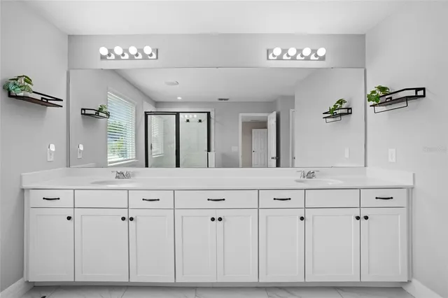 a room with gym equipment and windows