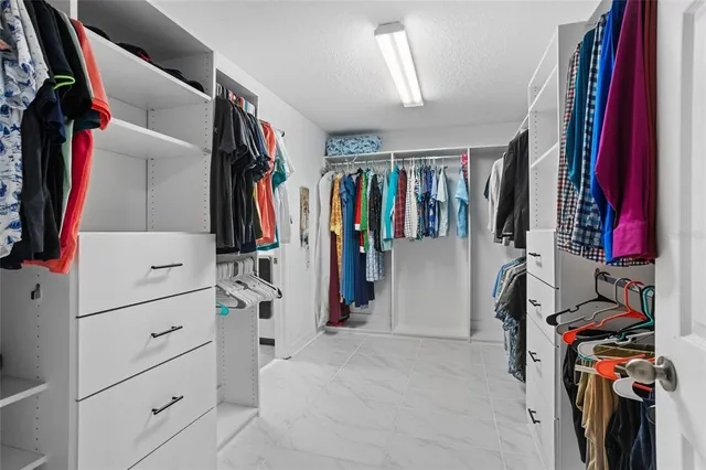 a bathroom with a sink toilet and tub