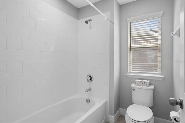 an aerial view of a house with garden space and outdoor space