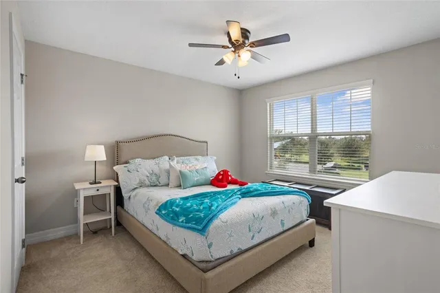 a view of house with outdoor space and swimming pool