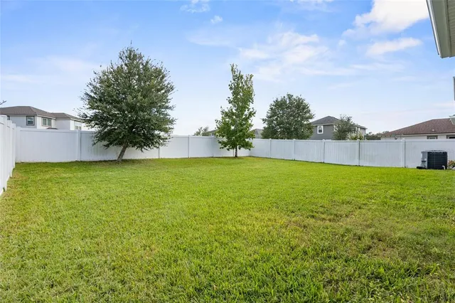 a balcony with chairs and with table