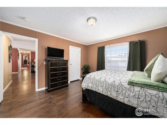 a kitchen with stainless steel appliances granite countertop a refrigerator a sink a stove and island