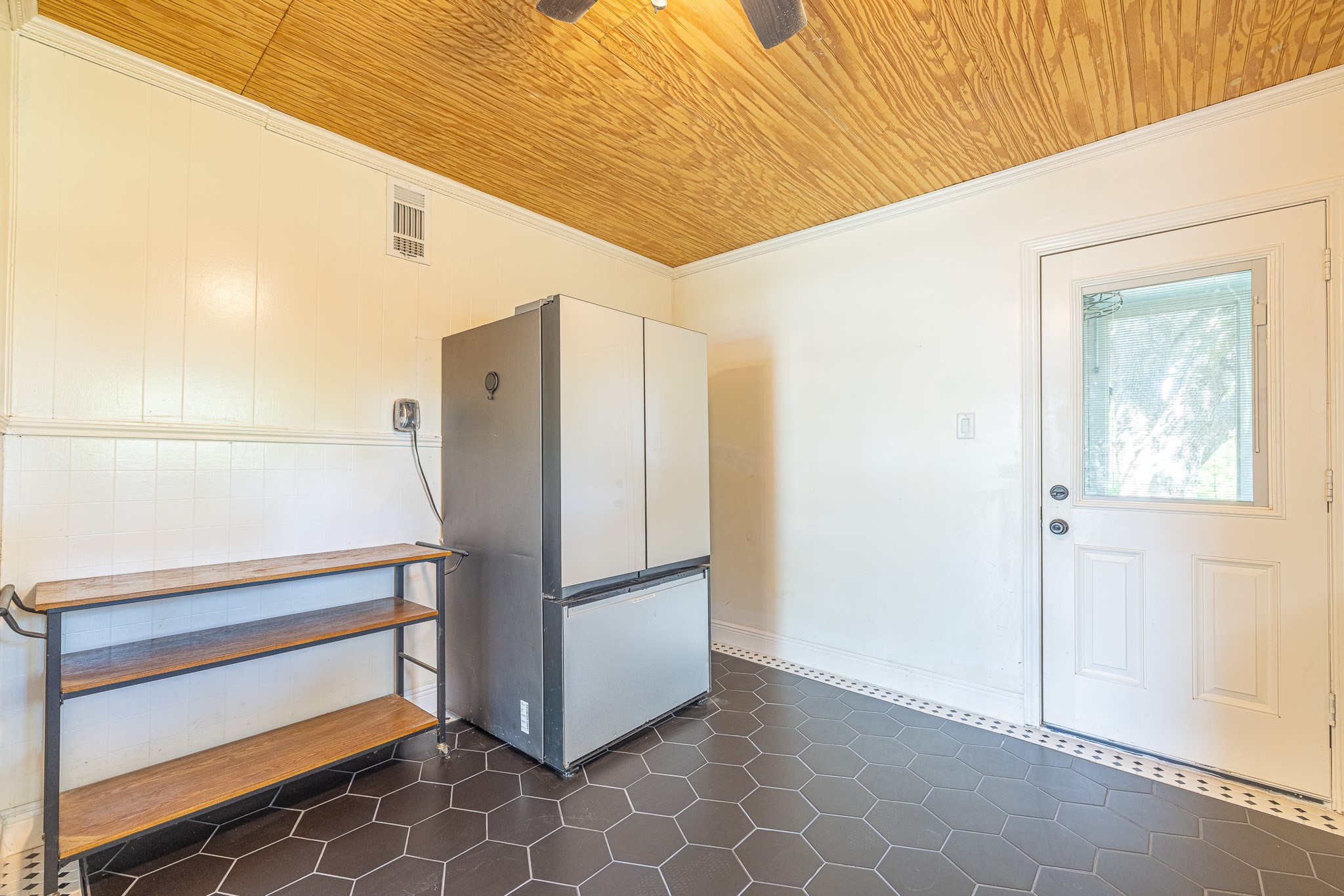 8548 Findlay Street Houston, TX 77017 - Photo 15 of 50 a kitchen with a refrigerator and countertop