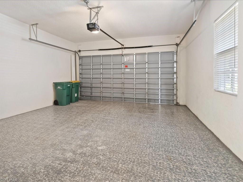 7832 Hawthorne Drive, Unit 1902 Naples, FL 34113 - Photo 26 of 43 a view of an empty room with a window