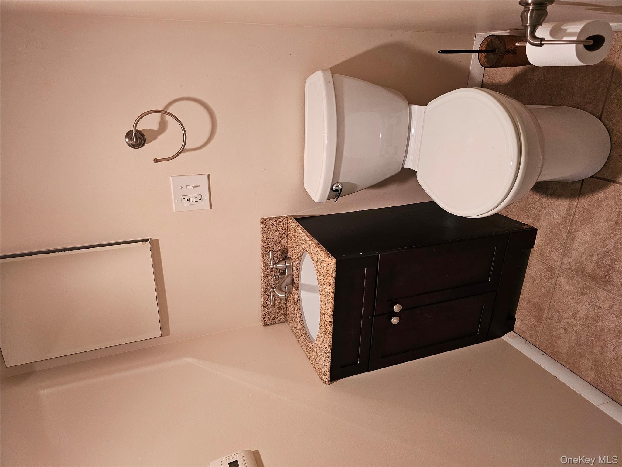 8 Laura Road Monroe, NY 10950 - Photo 9 of 12 Bathroom featuring vanity and light tile patterned flooring