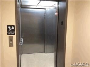 20 South Broadway, Unit 304 Nyack, NY 10960 - Photo 5 of 11 a bathroom with a glass shower door