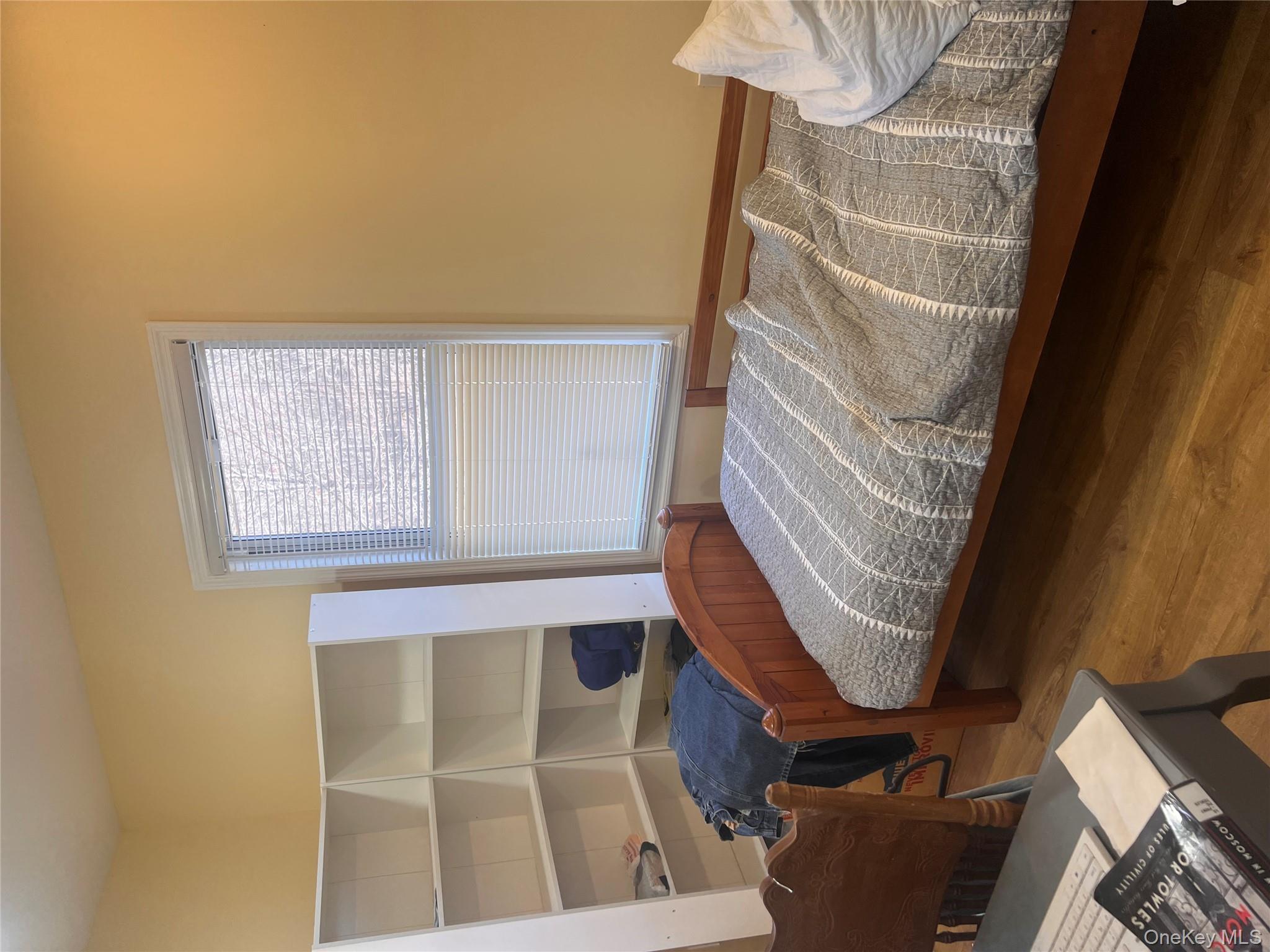 57 Menges Road Youngsville, NY 12791 - Photo 13 of 22 a bedroom with a bed and a window