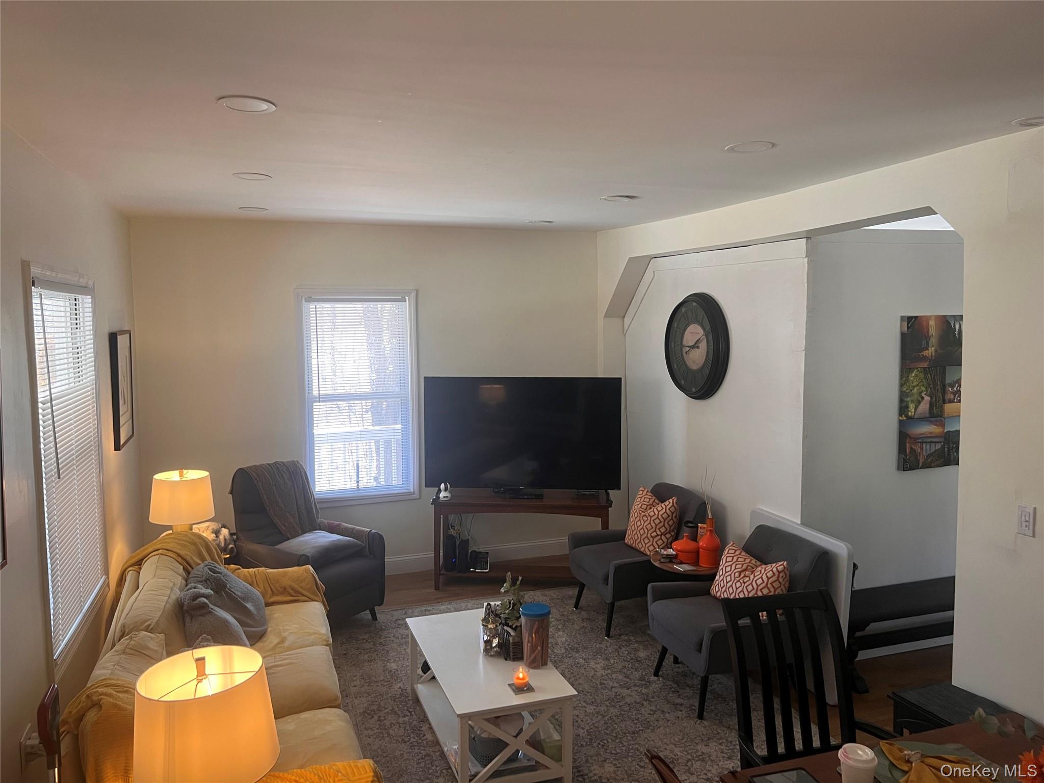 57 Menges Road Youngsville, NY 12791 - Photo 16 of 22 a living room with furniture and a flat screen tv