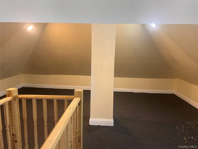 a view of a bathroom from the hallway