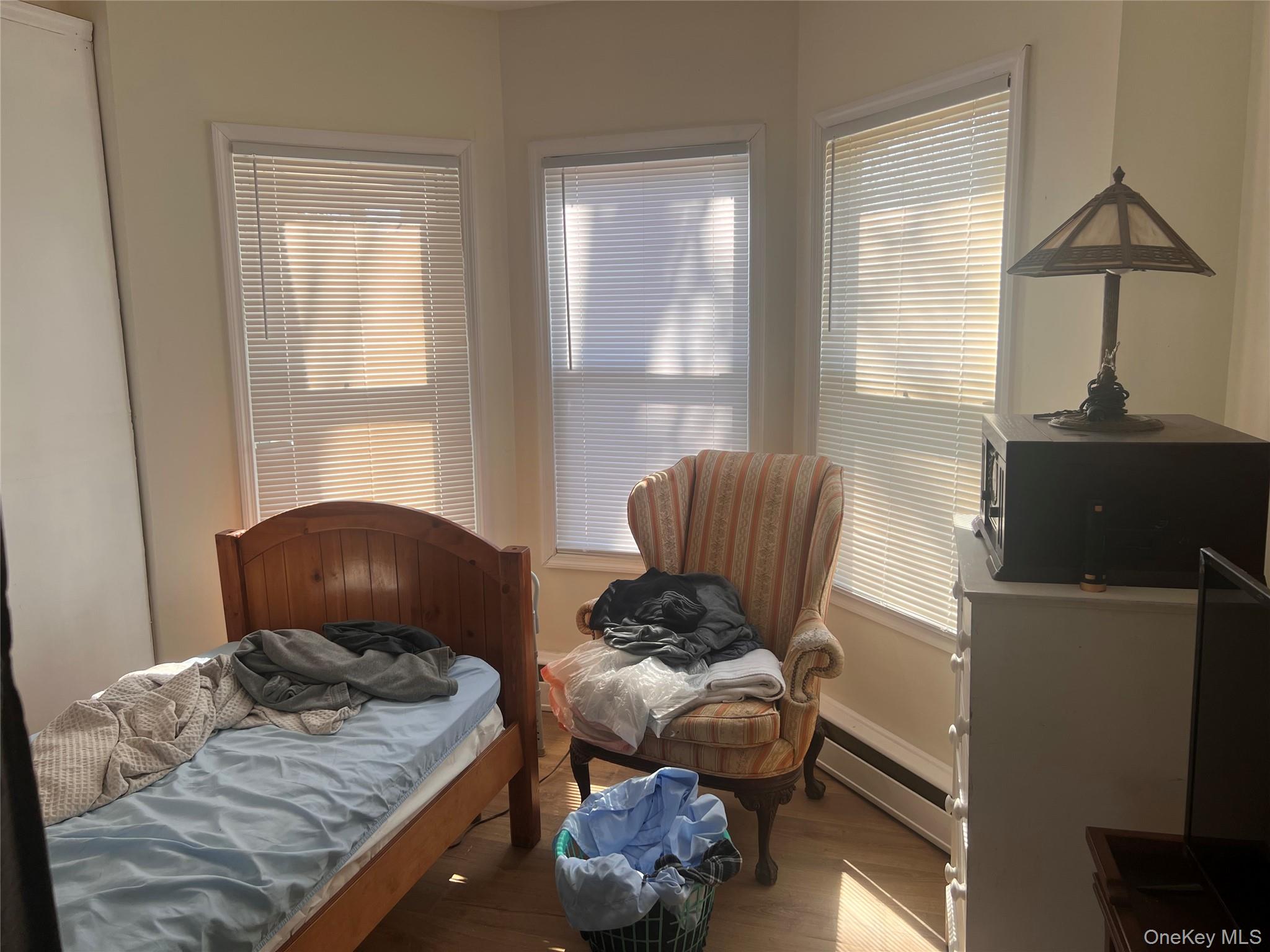 57 Menges Road Youngsville, NY 12791 - Photo 19 of 22 a living room with furniture and a window