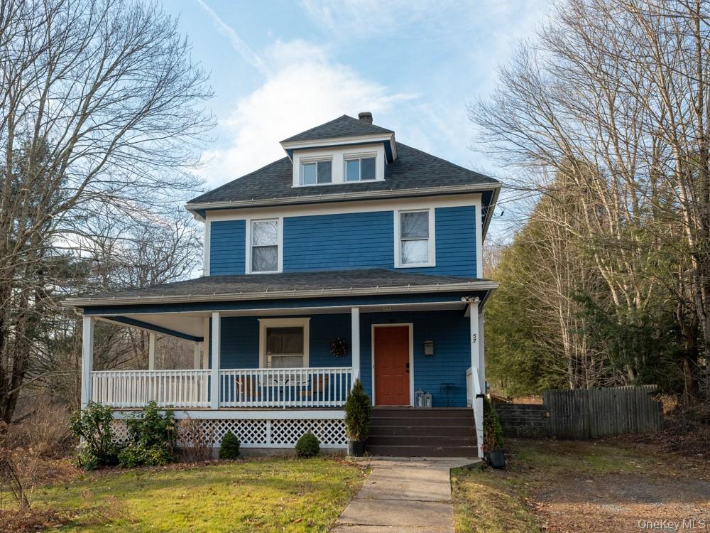 57 Menges Road Youngsville, NY 12791 - Photo 2 of 22 a front view of a house with garden