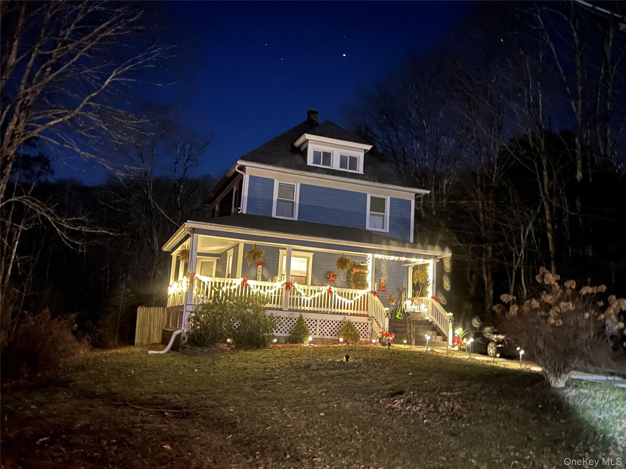 57 Menges Road Youngsville, NY 12791 - Photo 21 of 22 front view of house with a yard