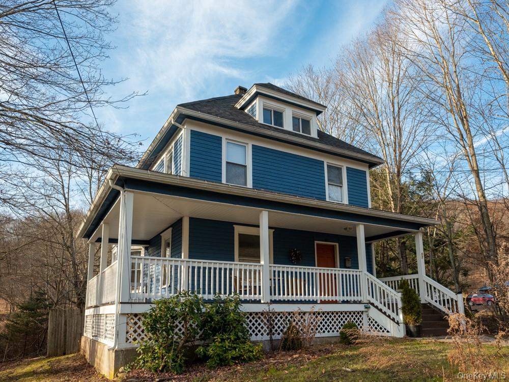 57 Menges Road Youngsville, NY 12791 - Photo 3 of 22 a front view of a house with a yard