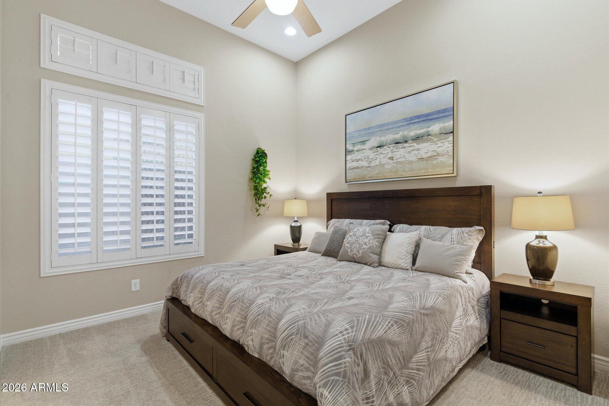 40322 North Hawk Ridge Trail Anthem, AZ 85086 - Photo 33 of 63 a bedroom with a bed and window