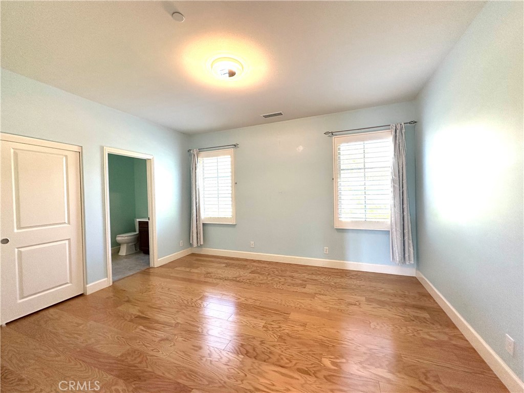 53 Triana Irvine, CA 92618 - Photo 32 of 42 an empty room with windows and closet