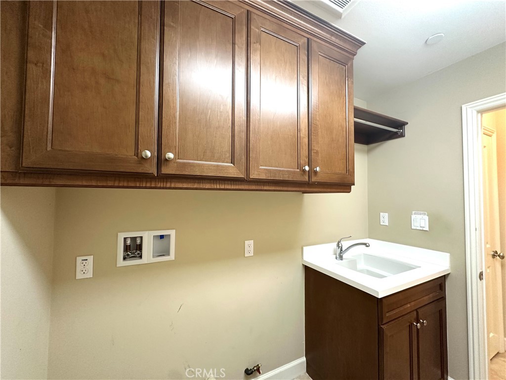 53 Triana Irvine, CA 92618 - Photo 4 of 42 a bathroom with a sink and a mirror