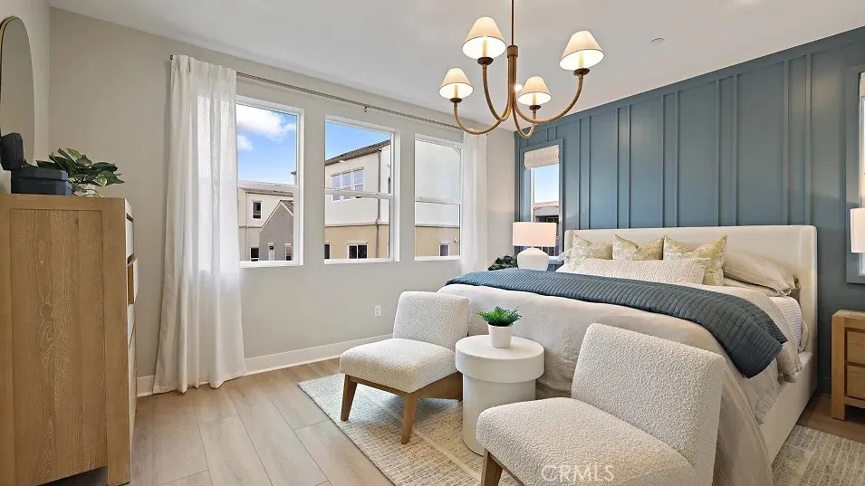 1711 Lychee Street Fullerton, CA 92835 - Photo 11 of 29 a bedroom with a bed and wooden floor