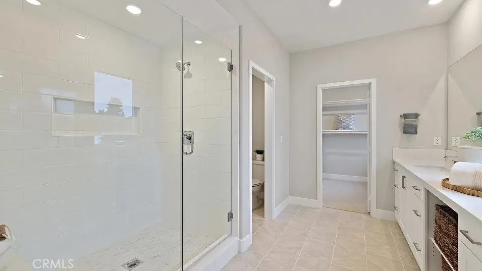 1711 Lychee Street Fullerton, CA 92835 - Photo 13 of 29 a spacious bathroom with a shower and a tub