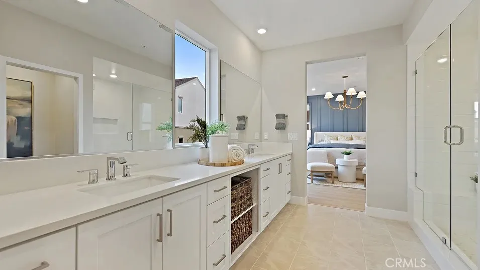 1711 Lychee Street Fullerton, CA 92835 - Photo 14 of 29 a spacious bathroom with a double vanity sink mirror and shower