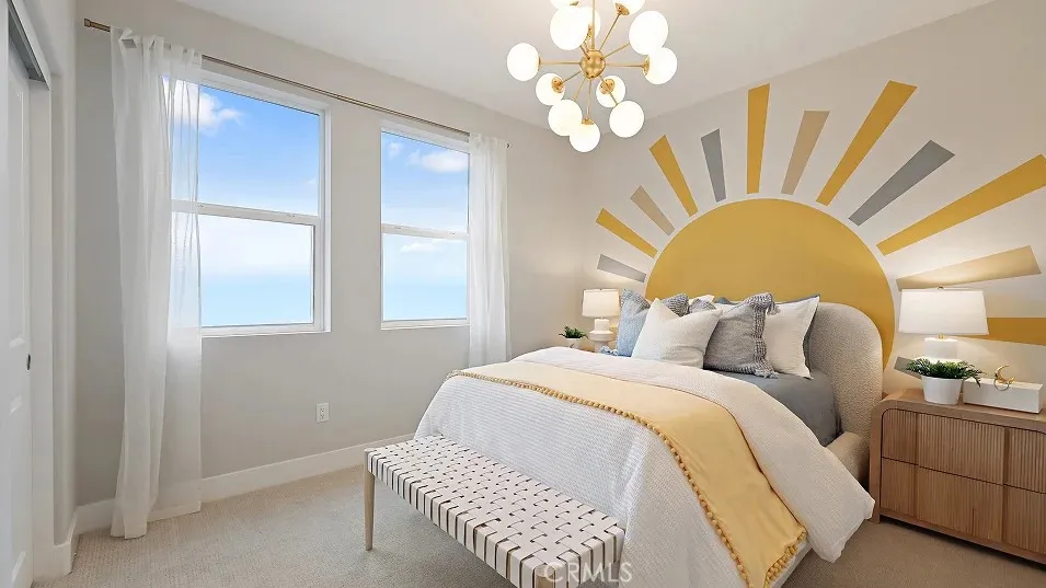 1711 Lychee Street Fullerton, CA 92835 - Photo 16 of 29 a bedroom with a bed and a chandelier