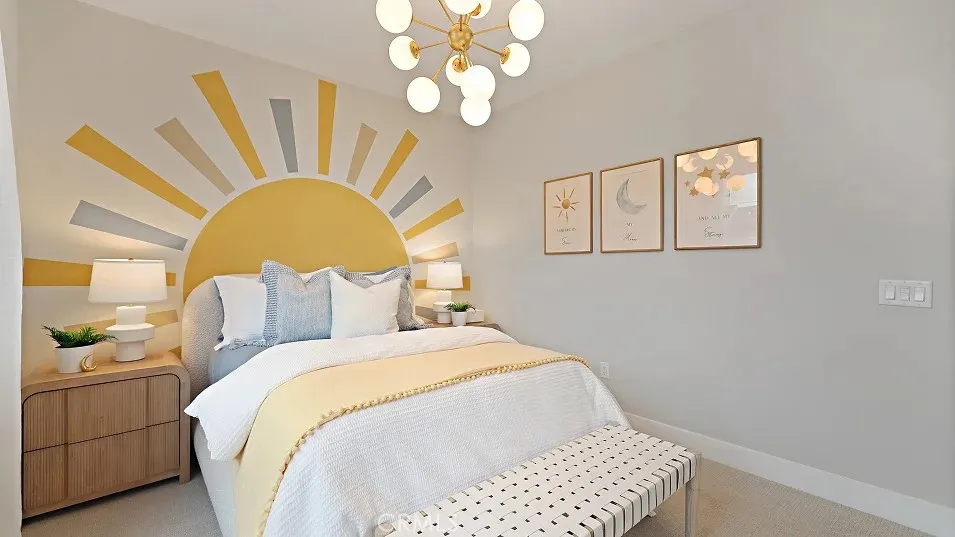 1711 Lychee Street Fullerton, CA 92835 - Photo 17 of 29 a bed room with a bed and a chandelier