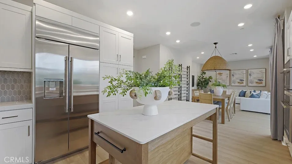 1711 Lychee Street Fullerton, CA 92835 - Photo 2 of 29 a kitchen with a table and chairs
