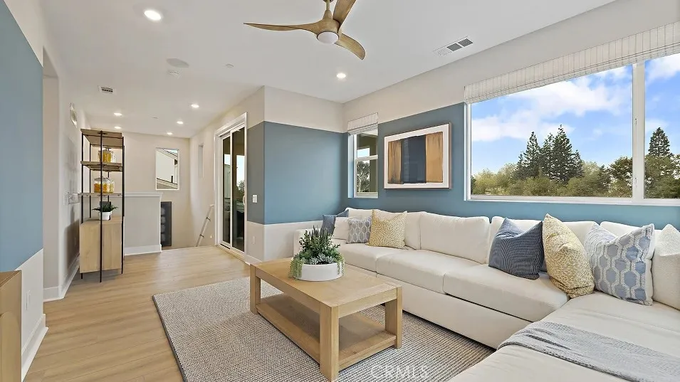 1711 Lychee Street Fullerton, CA 92835 - Photo 7 of 29 a living room with furniture and a large window