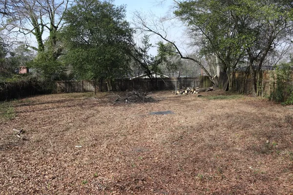 a fire hydrant in the middle of a field